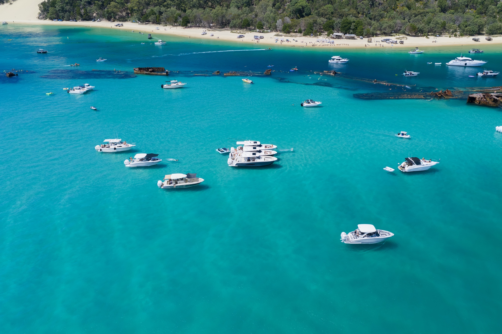 Boats anchored in turquoise waters